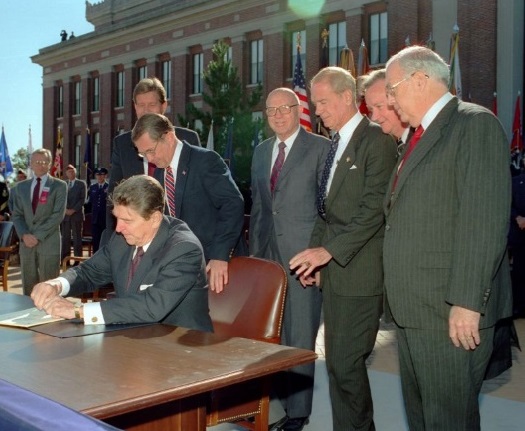 President Ronald Reagan signing to create Department of Veteran Affairs.